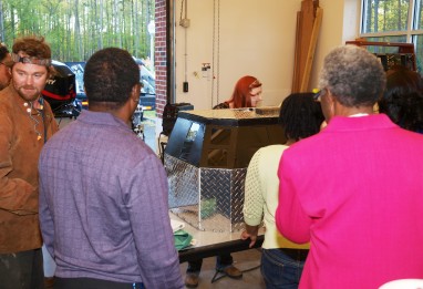 Amanda Thomas demonstrates welding techniques.